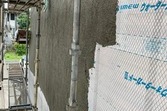熊本地震被害外壁修繕工事　下地張替え後左官工事